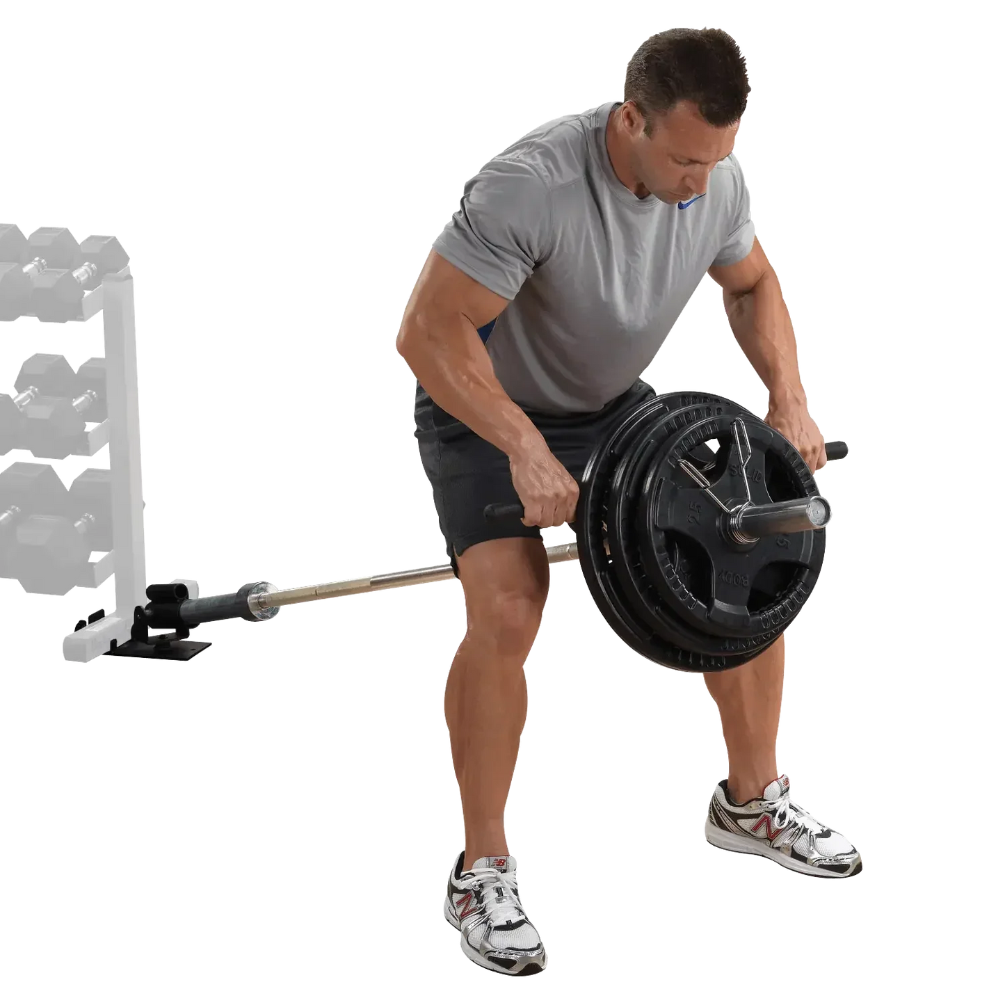 Mann trainiert mit Langhantel und Gewichten für Krafttraining im Homegym