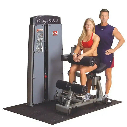 Body-Solid Kraftstation mit Frau und Mann beim Training, ideal für Homegym und Fitnessstudio