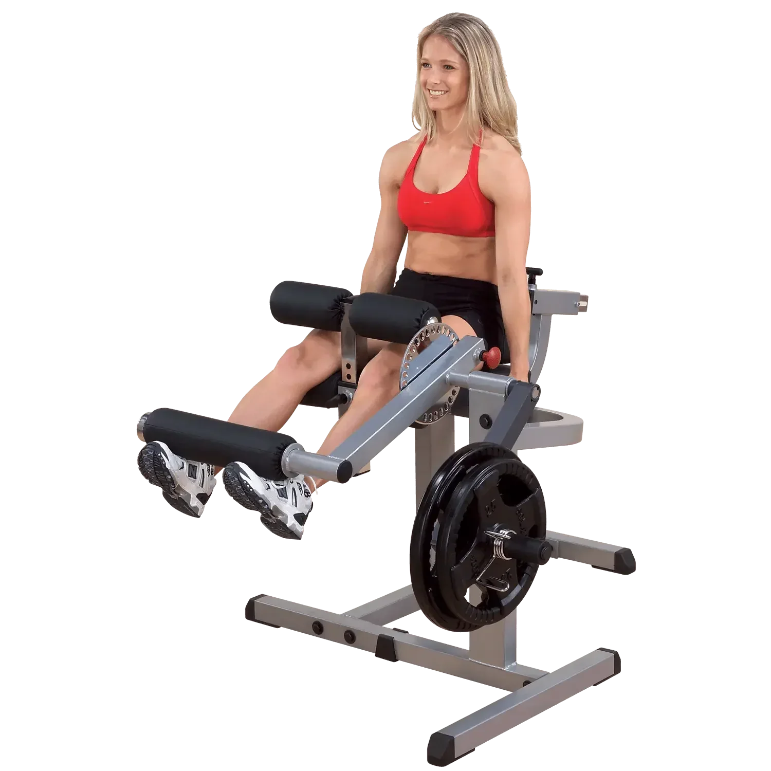 Frau trainiert Beine auf Fitness-Kraftgerät mit Gewichten für Homegym & Studio