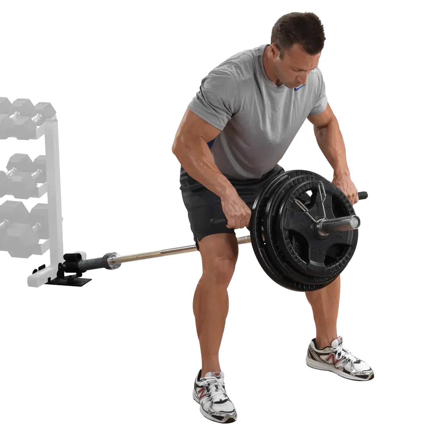 Mann trainiert mit Langhantel und Gewichten für Krafttraining im Homegym
